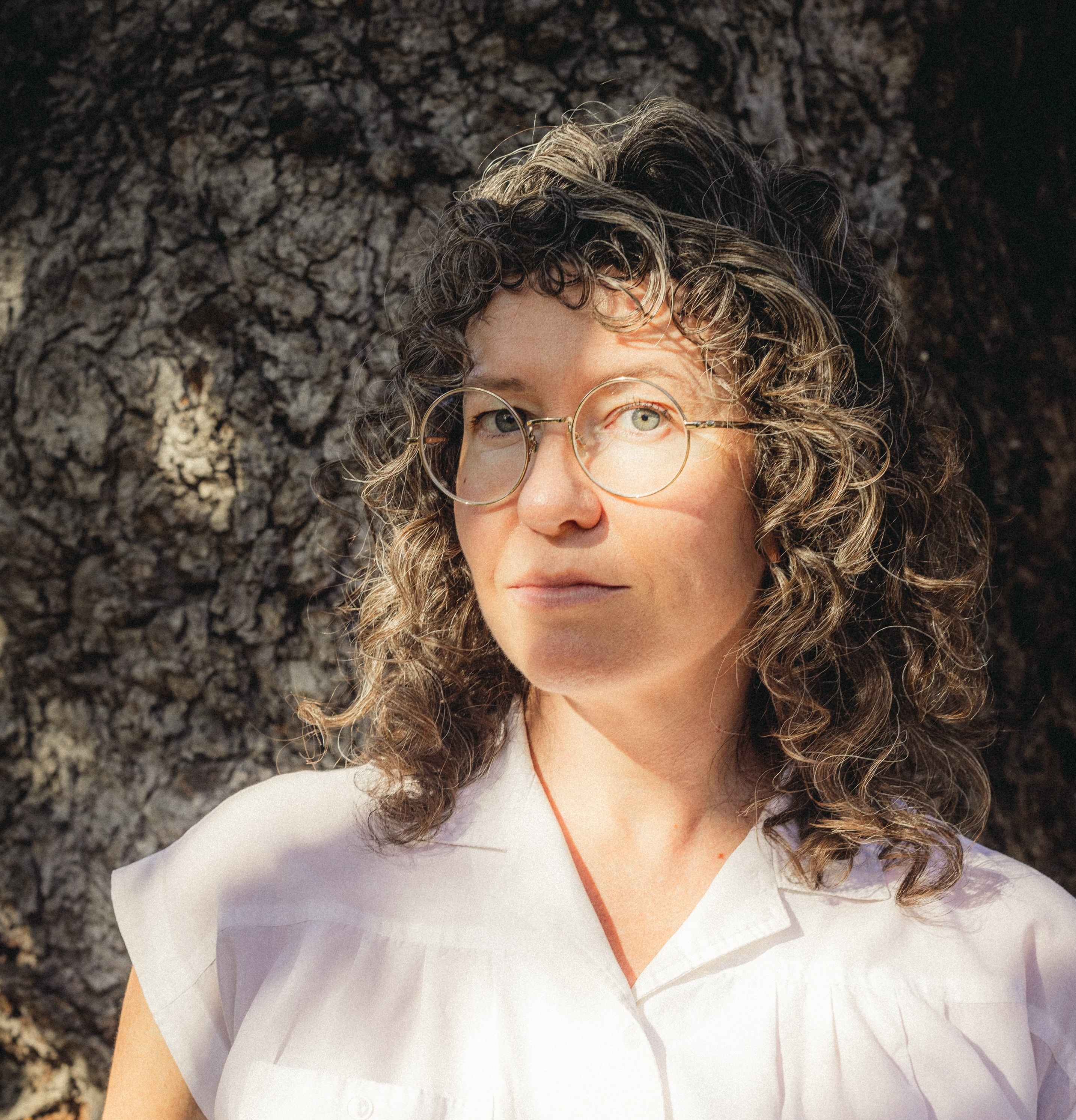 Headshot of Elizabeth Barry, co-founder of CrownShy